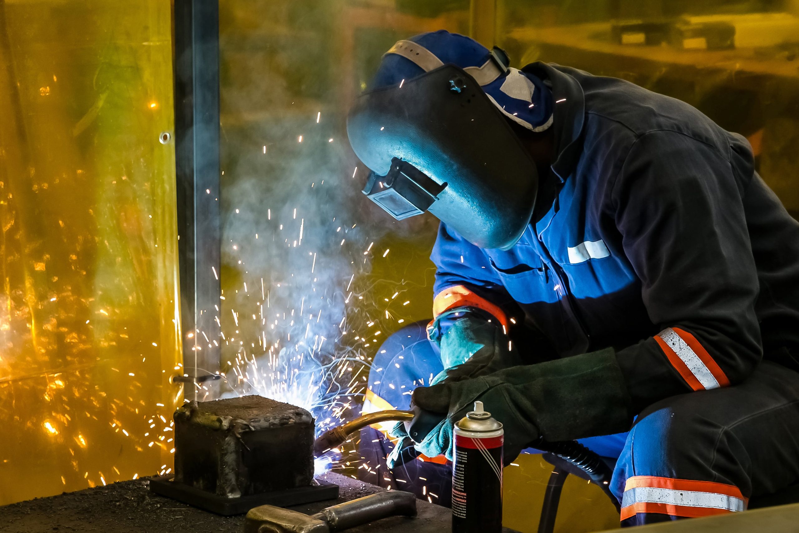 male-working-with-welding-torch-min